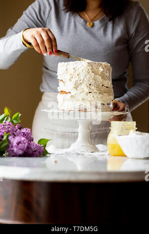 Woman preparing a cake Stock Photo