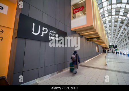 TORONTO, CANADA - NOVEMBER 13, 2018: UP Express logo in the access lounge in Union Station in Dowtown Toronto. Union Pearson Express is the Airport Ra Stock Photo