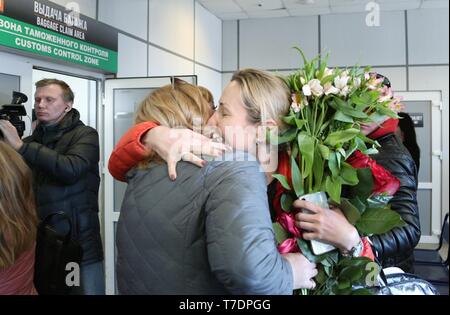 Murmansk, Russia. 6th May, 2019. Relatives meet the survived passenger at the plane fire at an airport in Murmansk, Russia, on May 6, 2019. Russia's Investigative Committee confirmed Monday that 41 people were killed after an SSJ-100 passenger plane en route to the northwestern Russian city of Murmansk caught fire before an emergency landing Sunday at the Sheremetyevo International Airport in Moscow. Credit: Sputnik/Xinhua/Alamy Live News Stock Photo