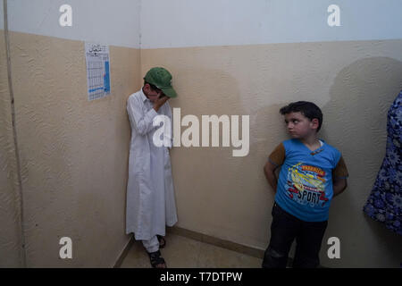 Gaza City, The Gaza Strip, Palestine. 6th May, 2019.  The brother to the deceased seen mourning during the funeral of Maria al-Gazali, a four-month-old Palestinian baby who was martyred in an Israeli raid that hit her house and completely destroyed it. Credit: Mohamed Zarandah/SOPA Images/ZUMA Wire/Alamy Live News Stock Photo