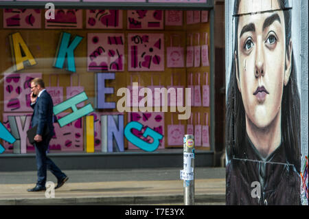 Manchester, UK. 7th May 2019. A new piece of street art has appeared in Stevenson Square in the Northern Quarter of Manchester, UK. The art work depicts the Game of Thrones character Arya Stark, played by actress Maisie Williams, and was created by artist Akse, the French-born street artist who has been living and working in Manchester since 1997. It's all part of outdoor public art project Outhouse MCR, which oversees the street art-rich part of the city centre. Credit: Paul Heyes/Alamy Live News Stock Photo