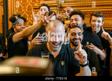 Hamburg, Germany. 07th May, 2019. Mike Taylor, coach of the basketball team of the Hamburg Towers, celebrates his promotion to the first Bundesliga with his team in the city hall. Credit: Axel Heimken/dpa/Alamy Live News Stock Photo