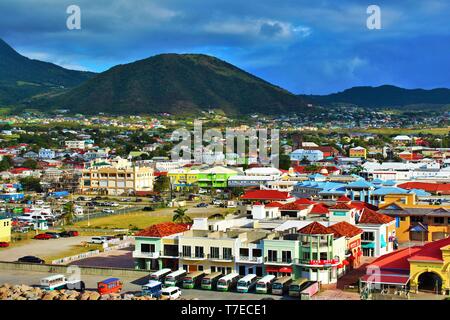 View from the top of a cruise ship docked in port, of the colourful landscape of Basseterre, the capital of St Kitts & Nevis. Stock Photo