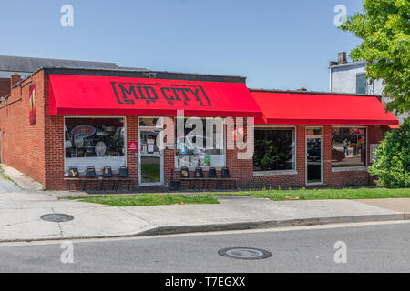 JOHNSON CITY, TN, USA-4/27/19: The Mid City Grill, a restaurant in downtown with a bright red awning. Stock Photo