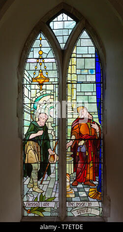 Stained glass window church of Saint Mary, Martlesham, Suffolk, England, UK by Walter J Pearce in Arts and Craft style, 1903 Blessed are the poor in s Stock Photo