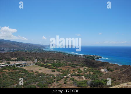view of ocean and city from top of diamond head state monument trail hike in Oahu Hawaii Stock Photo