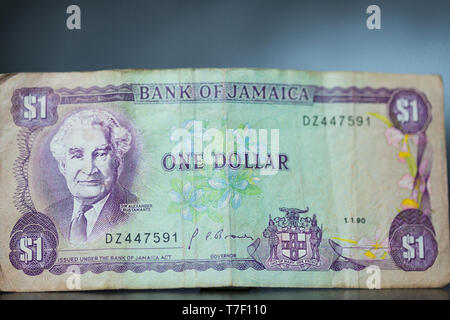 Toronto, Ontario / Canada - April 2019: An out of circulation Jamaican One Dollar Bill displaying The Right Excellent Sir Alexander Bustamante Stock Photo