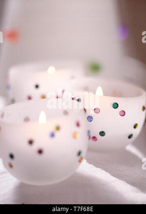 Close-up of decorated glass tea light holders Stock Photo