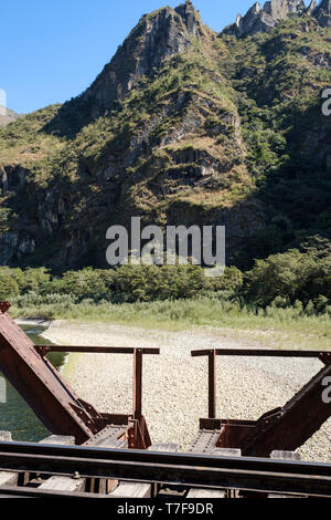 Metal bridge over Urubamba River on the railway to Aguas Calientes and Machu Picchu in Peru Stock Photo