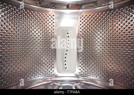 Interior of an empty washing machine drum Stock Photo