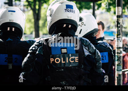 Paris France May 04, 2019 View of a riot squad of the French National Police in intervention during protests of the Yellow Jackets against the policy  Stock Photo