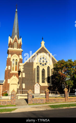 Facade of St Paul Presbyterian Church, built in 1881-82 in Gothic Revival design with a tall steeple, arched lancet windows and an impressive rose win Stock Photo