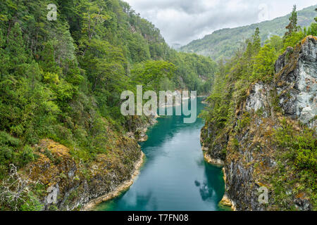An amazing landscape at north Chilean Patagonia, Puelo river moves around the narrow gorge with its turquoise waters on an awe idyllic  environment Stock Photo