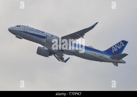 Osaka, Japan - Apr 19, 2019. JA213A All Nippon Airways Airbus A320 NEO taking-off from Kansai Airport (KIX). The airport located on an artificial isla Stock Photo