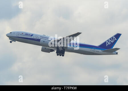 Osaka, Japan - Apr 19, 2019. JA717A All Nippon Airways Boeing 777-200ER taking-off from Kansai Airport (KIX). The airport located on an artificial isl Stock Photo
