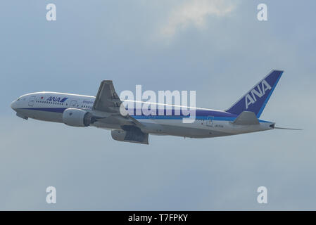 Osaka, Japan - Apr 19, 2019. JA717A All Nippon Airways Boeing 777-200ER taking-off from Kansai Airport (KIX). The airport located on an artificial isl Stock Photo