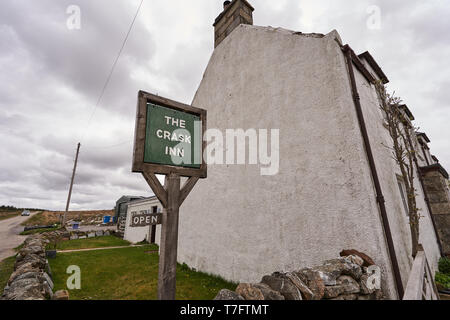 Cycle marker at the Crask inn. John o' groats (Duncansby head) to lands end. End to end trail. Caithness. Highlands. Scotland. UK Stock Photo