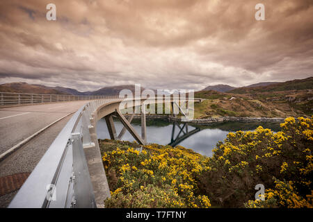 Kylesku Bridge over the Loch a Chairn Bhain in Sutherland, Scotland, part of the North Coast 500 scenic drive Stock Photo