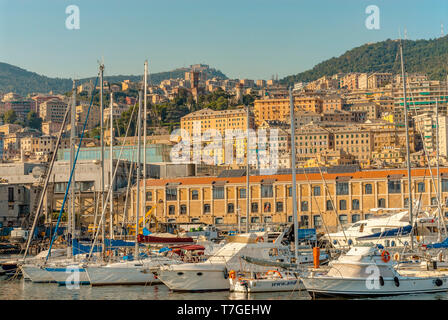 Yachts and sailing ship at Porto Antico harbour of Genoa, Liguria, North West Italy Stock Photo