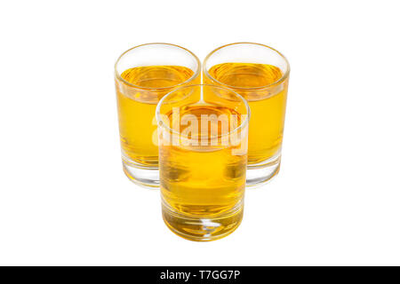 Yellow transparent cocktails, a set of shots pile, wedge, three servings, with taste of lemon, orange, view from above, isolated white background Stock Photo