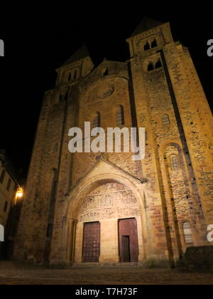 Abbey-Church of Saint-Foy in Conques during the night. A historic town along the Via Podiensis in southern France. Stock Photo