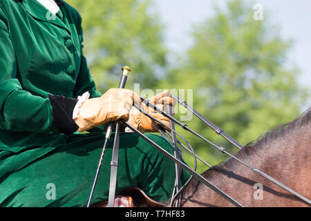 Pura Raza Espanola, Andalusian. Rider with costume and sidesaddle showing correct manner of holding the reins. Switzerland Stock Photo