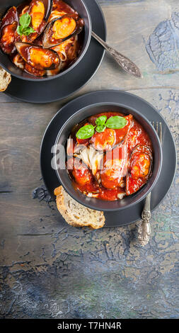 Mussels in tomato sauce and spaghetti. Mussels pasta. Top view Mediterranean Kitchen Stock Photo