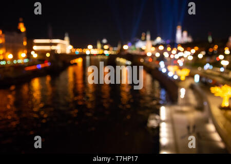 Abstract city lights background. Defocused urban background at night. Bokeh multicolored Stock Photo