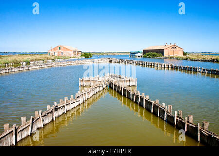 The Comacchio valleys (Ferrara, Italy) are known worldwide for eel fishing - UNESCO protected area Stock Photo