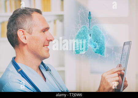 Medical doctor using tablet pc at the consulting room Stock Photo