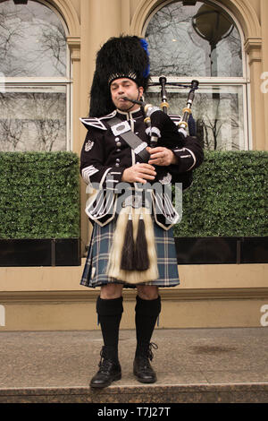 Bagpipe Player Dressed in Kilt Stock Photo