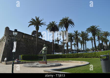 Statue Dedicated To King Charles And A Couple In Love Kissing Beside The Sculpture In Cascais. Photograph of Street, Nature, architecture, history. Ap Stock Photo