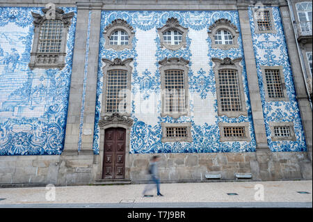 Traditional azulejos (blue tiles) outside church Igreja do Carmo, Rua do Carmo Porto, Portugal Stock Photo