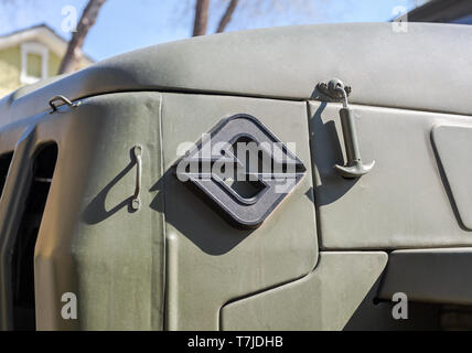 Samara, Russia - May 4, 2019: Close up view of emblem russian military Ural truck vehicle. Logo of army truck Ural Stock Photo