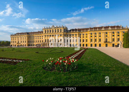 Schonbrunn Palace, view of the parterre garden and baroque exterior of the south side of the Schloss Schönbrunn in Vienna, Austria.