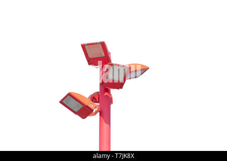 close up of a red led lighting pole with four lamps isolated on and a white background horizontal Stock Photo