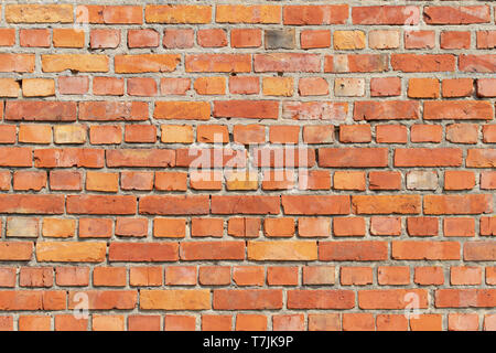A brick wall as background, very sharp nice orange color and beautiful structure Stock Photo