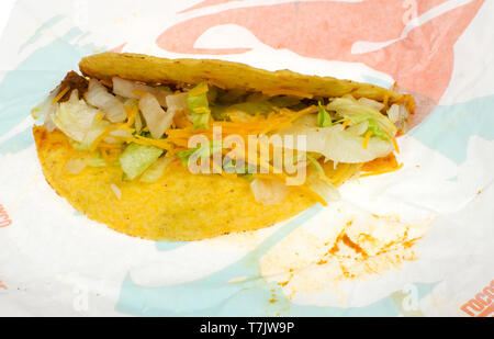 Taco Bell crunchy taco on wrapper Stock Photo