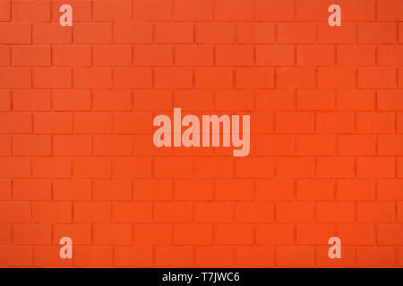 Orange red painted brick wall Stock Photo