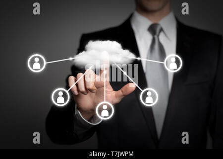 internet, technology, network, business concept - businessman in suit presses virtual touchscreen interface - cloud computing Stock Photo