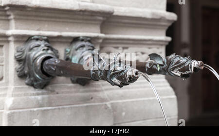 Vintage drinking water fountain in old Lucerne town, Switzerland Stock Photo