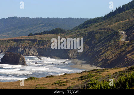 The scenic coast of northern California, along Highway 101 showing the road that hugs the cliffs along the ocean on a summer day Stock Photo