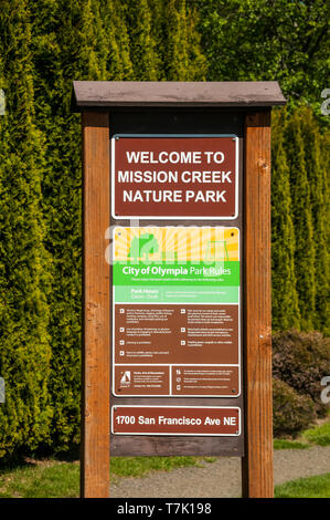 Trail-head sign at Mission Creek Nature Park in Olympia, Washington. Stock Photo