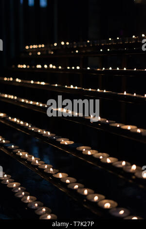 many victim candles in a church Stock Photo