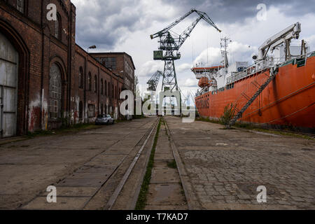 Krakow, Poland. 4th May, 2019. A view of a giant crane and a partial inactive part of Gdansk Shipyards open for tourists.Gdansk is a port city located of the Baltic coast of Poland. In 2018, Gdansk was among the 5 best tourist destinations in the world according to the internet portal Trip Advisor. Apart from being a famous tourist destination, in the 1980s it would become the birthplace of the Solidarity movement, which brought an end to Communism in Poland and played a huge part to end the Soviet Union. Credit: Omar Marques/SOPA Images/ZUMA Wire/Alamy Live News Stock Photo