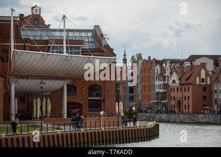 Krakow, Poland. 4th May, 2019. People seen walking by the boulevard next to Motlawa river at the old town.Gdansk is a port city located of the Baltic coast of Poland. In 2018, Gdansk was among the 5 best tourist destinations in the world according to the internet portal Trip Advisor. Apart from being a famous tourist destination, in the 1980s it would become the birthplace of the Solidarity movement, which brought an end to Communism in Poland and played a huge part to end the Soviet Union. Credit: Omar Marques/SOPA Images/ZUMA Wire/Alamy Live News Stock Photo