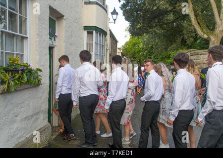 Helston, Cornwall, UK. 8th May 2019. Helston Flora day annual spring festival. Seen here the 7am morning dance, which was originally for workers and servants to take part in before they had to attend to their duties.. Credit Simon Maycock / Alamy Live News. Stock Photo