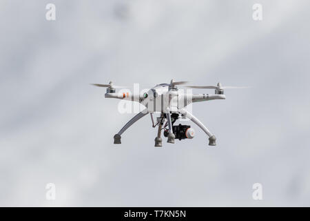 Walkera drone quadrocopter quadcopter with camera flying over the snowy land Stock Photo
