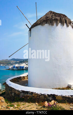 Greek iconic windmill and little venice panorama in Mykonos, Greece, famous island in Cyclades Stock Photo