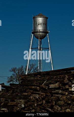 City of Canyon Original Water Pressure Tower with Railroad Track Post Pile, near Old Canyon Rail Road Station, Canyon, Texas. Stock Photo